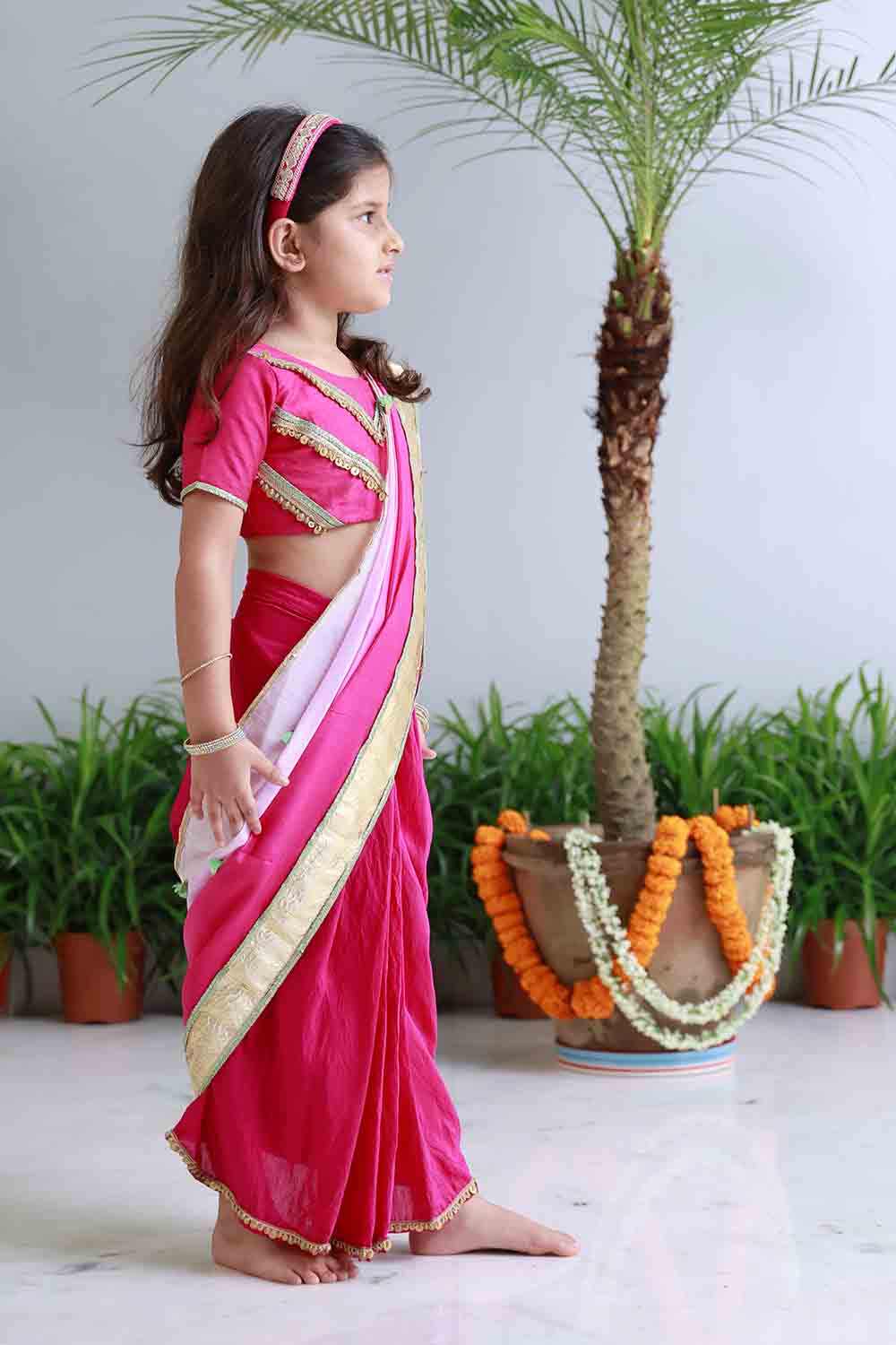 Fuchsia shaded pre draped sari for infant girls