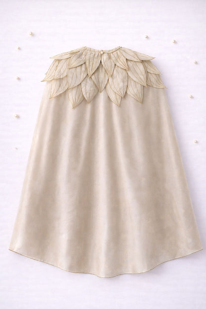 Handmade gold tissue petal cape and dress