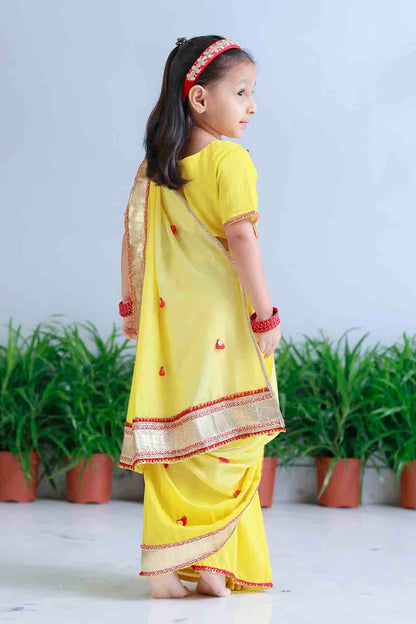 Yellow shaded pre draped sari for infant girls