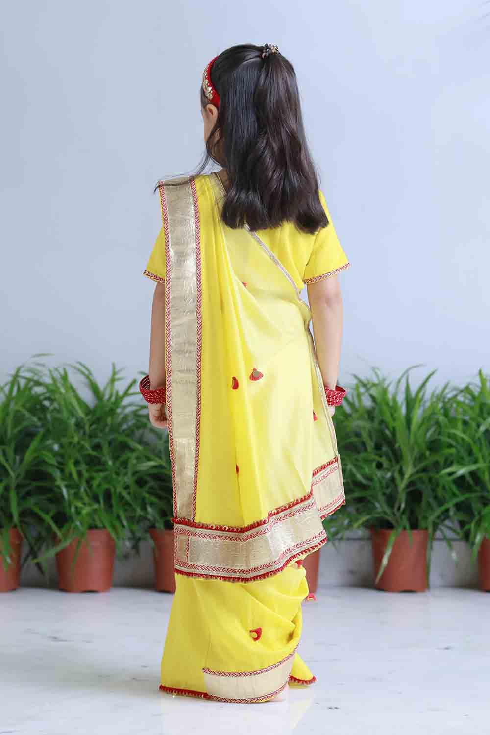 Yellow shaded pre draped sari for infant girls